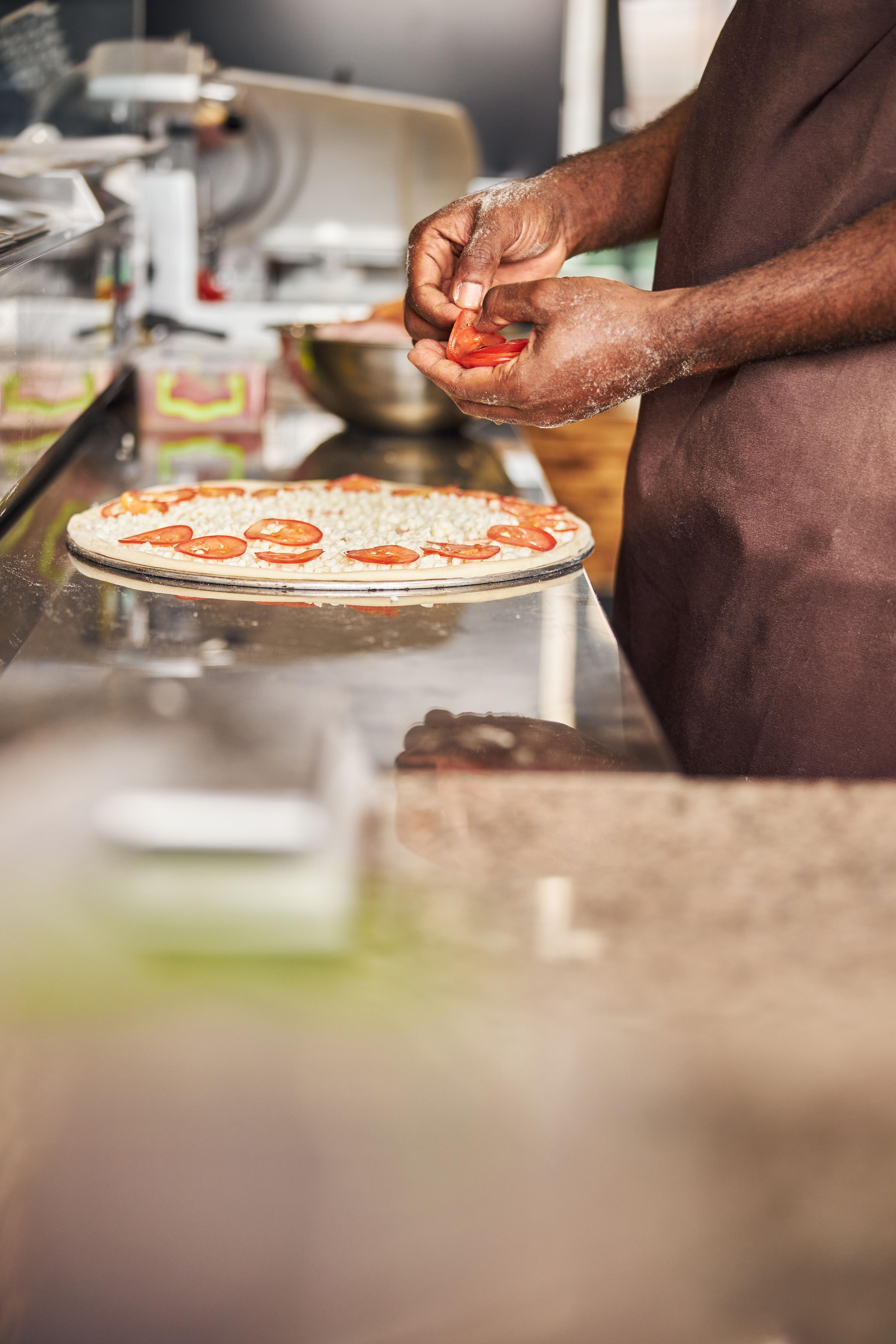 Picture of pizza being made