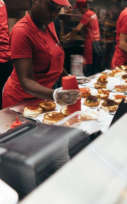 Picture of employee making burgers